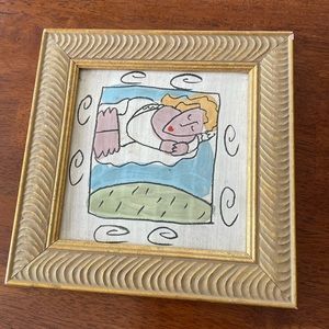 Gold framed tile signed 8 1/2 x 8 1/2.